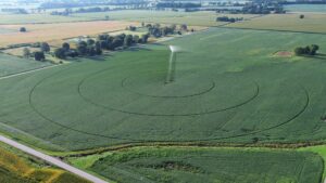 Overhead view of center pivot irrigation in soybean field